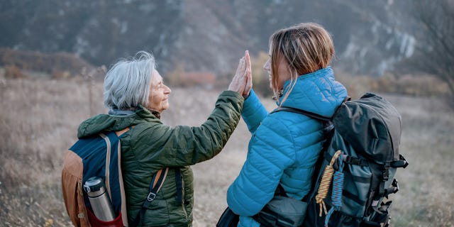 Mother and daughter hiking